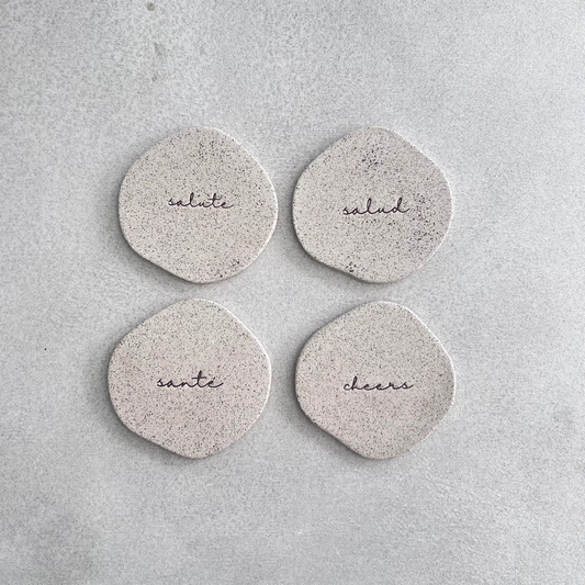 set of four ceramic coasters
