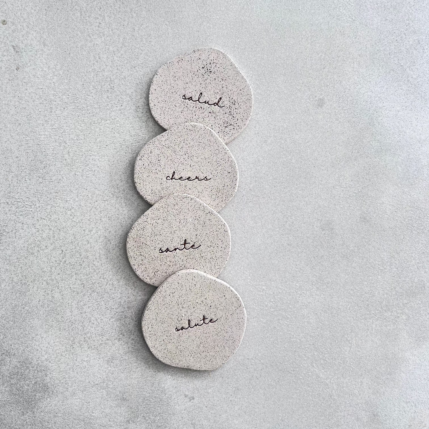 set of four ceramic coasters