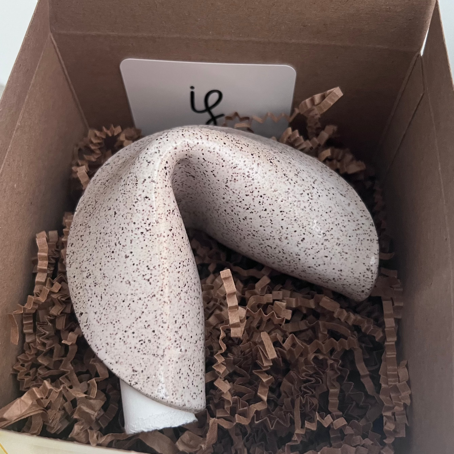 ceramic fortune cookie with packaging