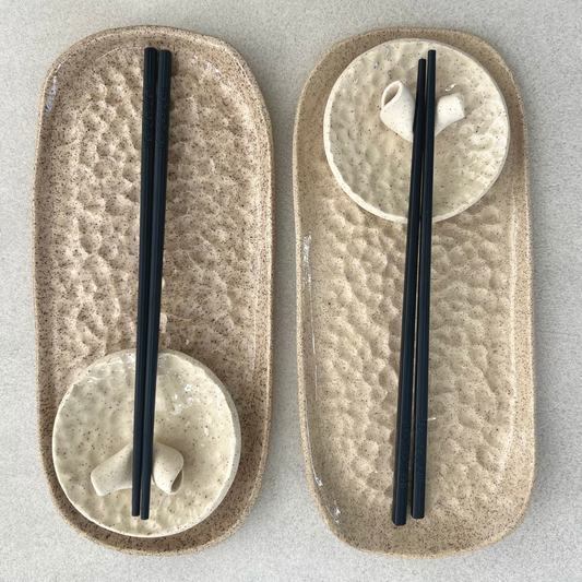 sushi dining set: chopsticks, chopstick holders, dipping dish and plate