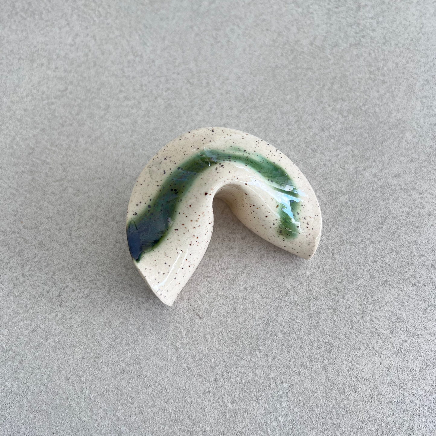 
ceramic fortune cookie
