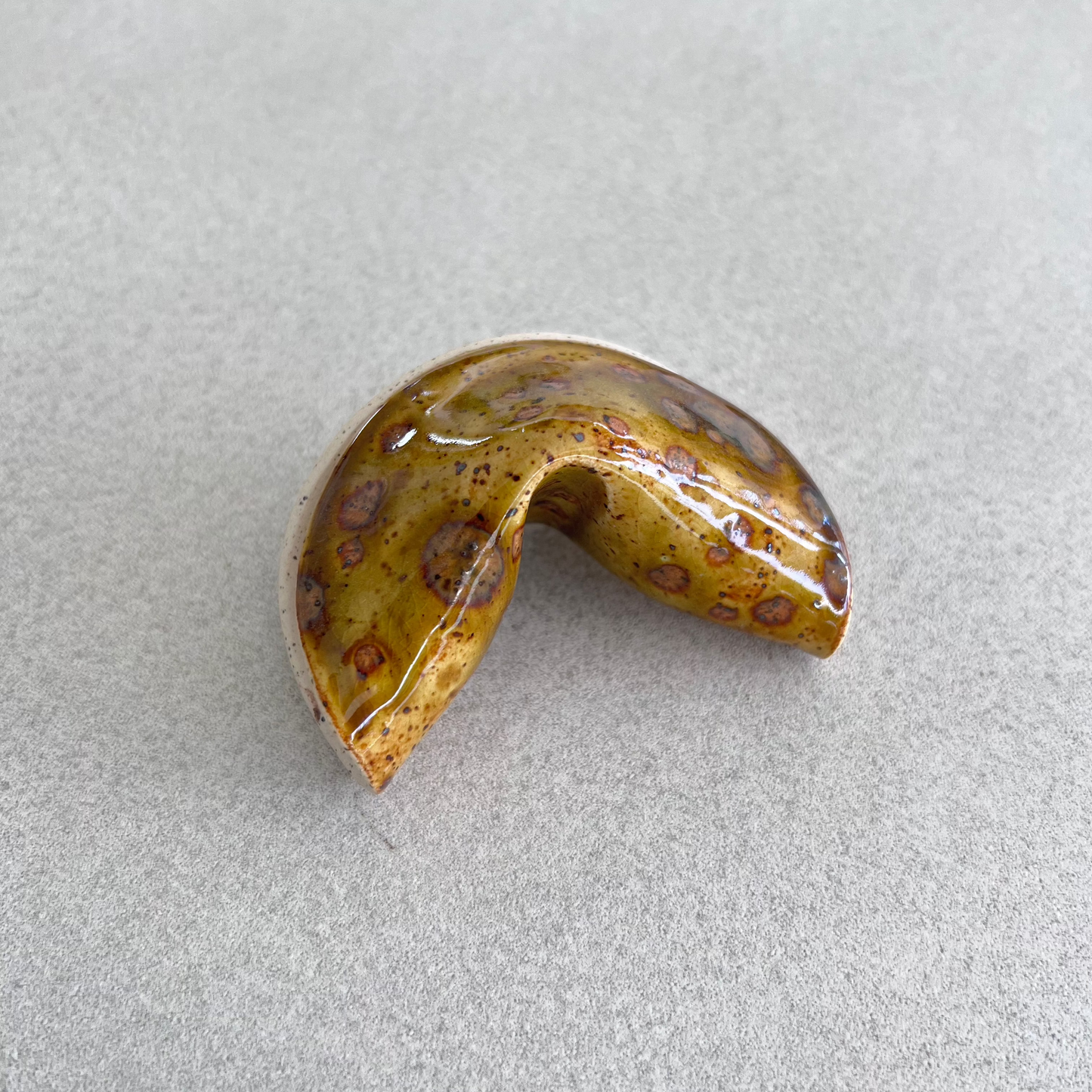 
ceramic fortune cookie
