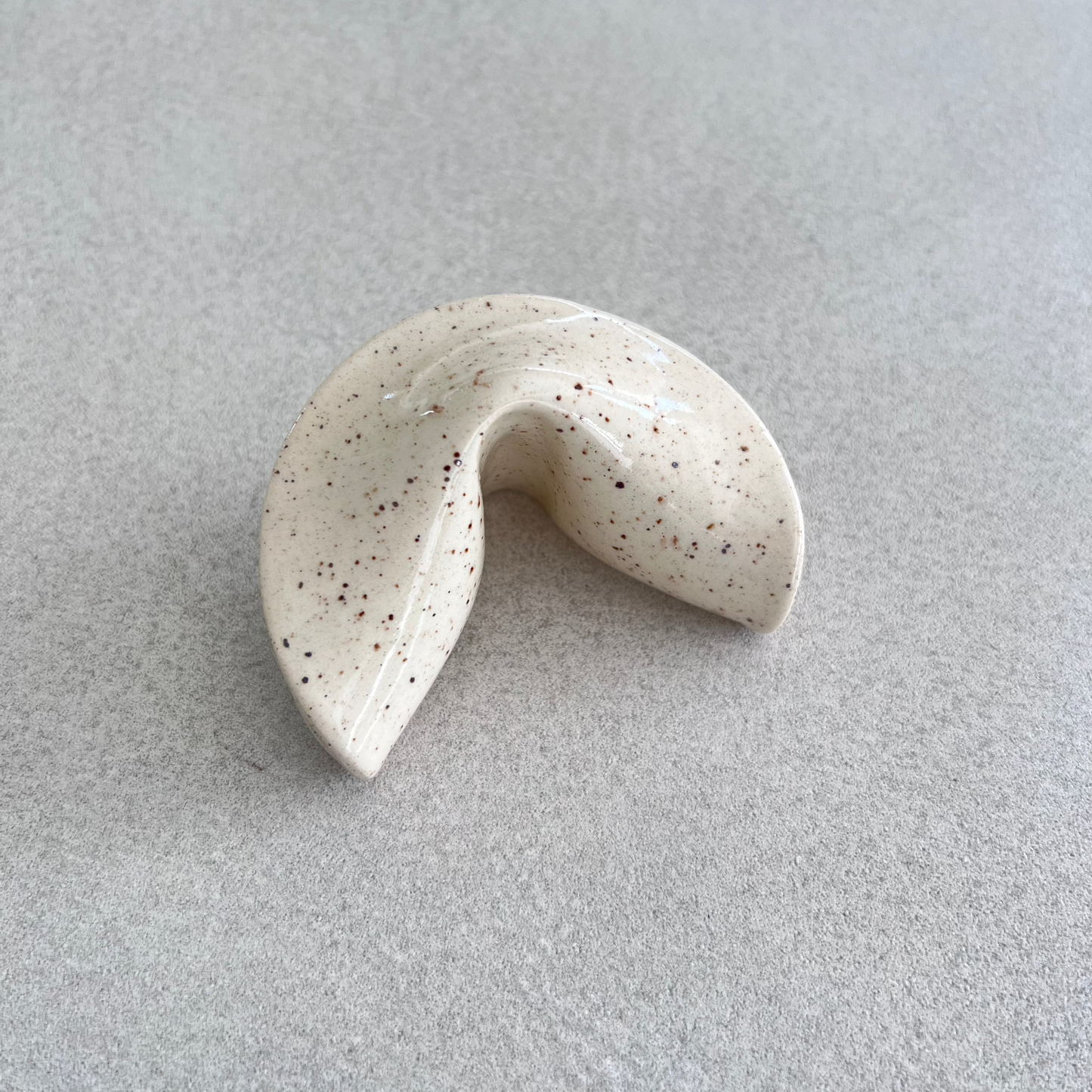
ceramic fortune cookie
