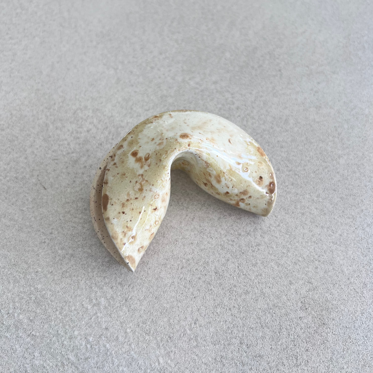 
ceramic fortune cookie
