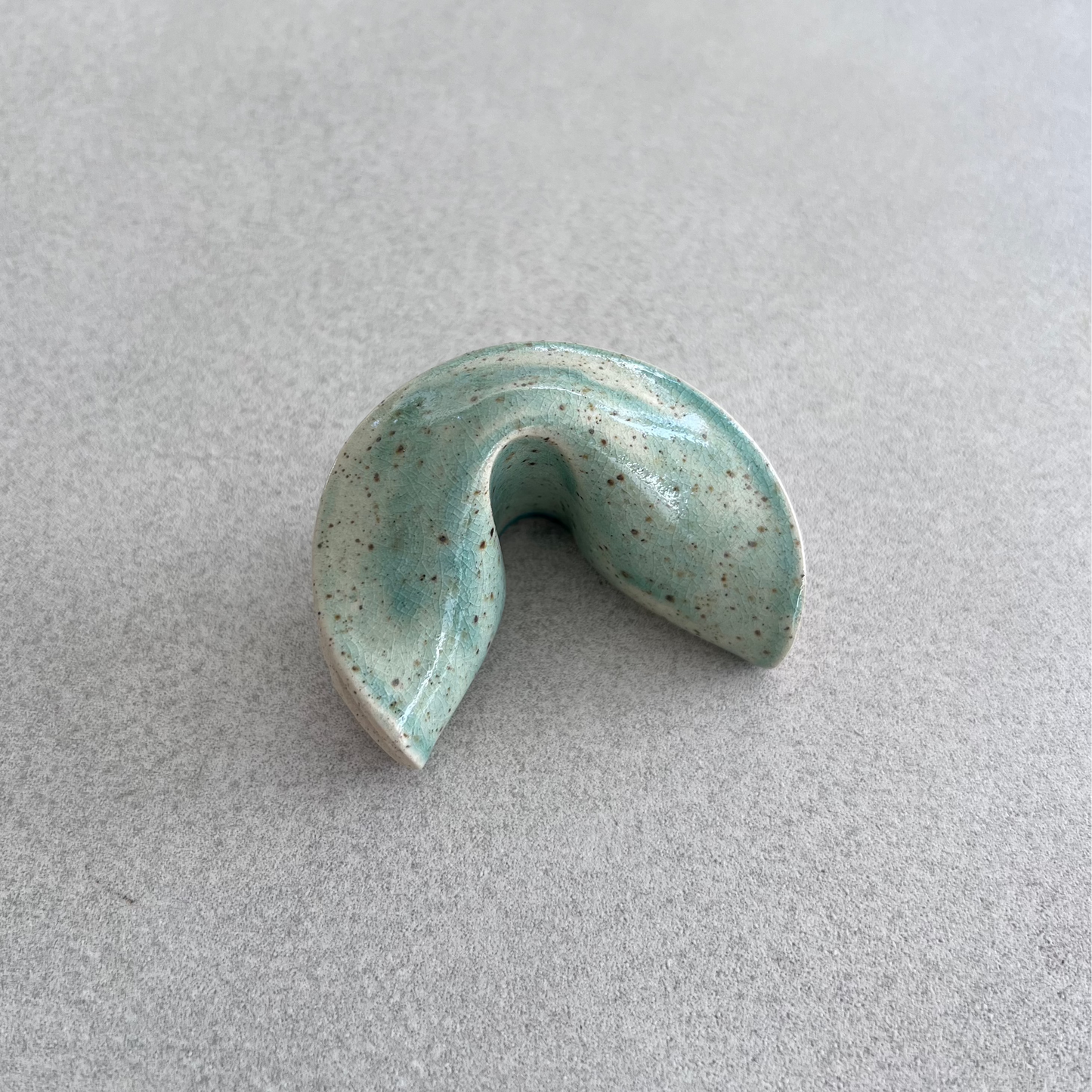 
ceramic fortune cookie
