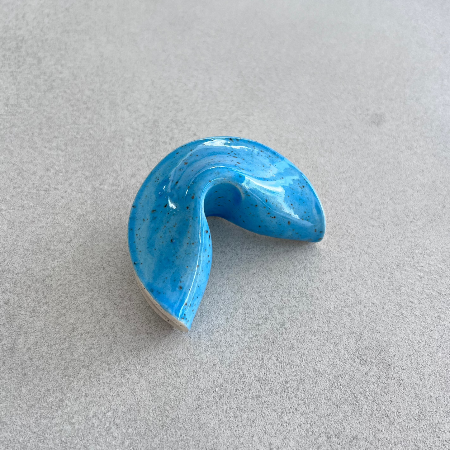 
ceramic fortune cookie
