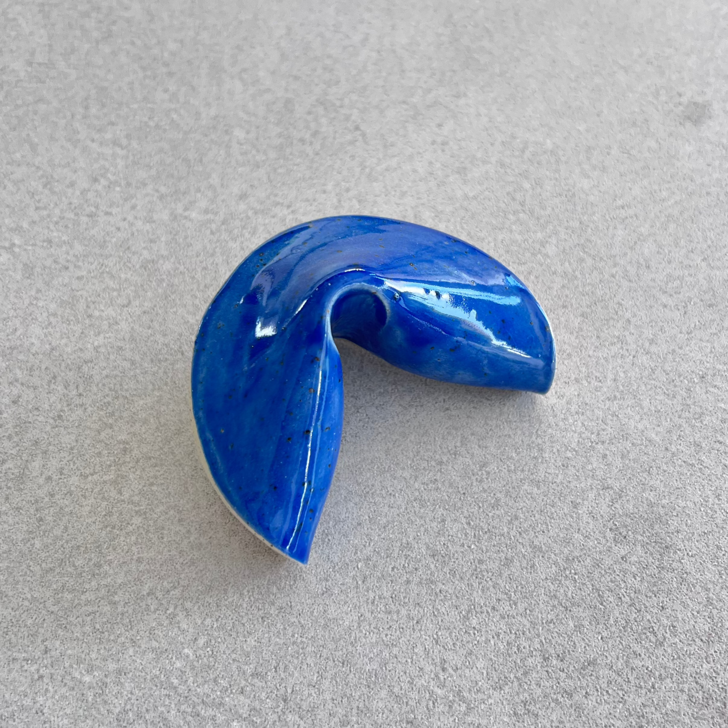 
ceramic fortune cookie
