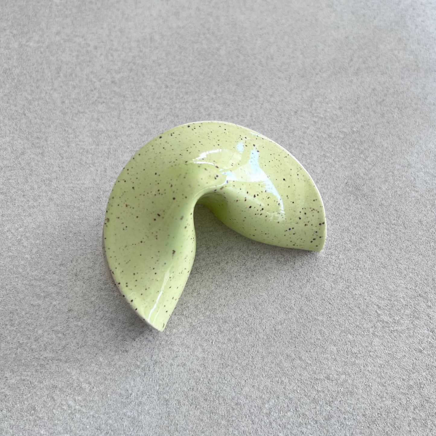 
ceramic fortune cookie
