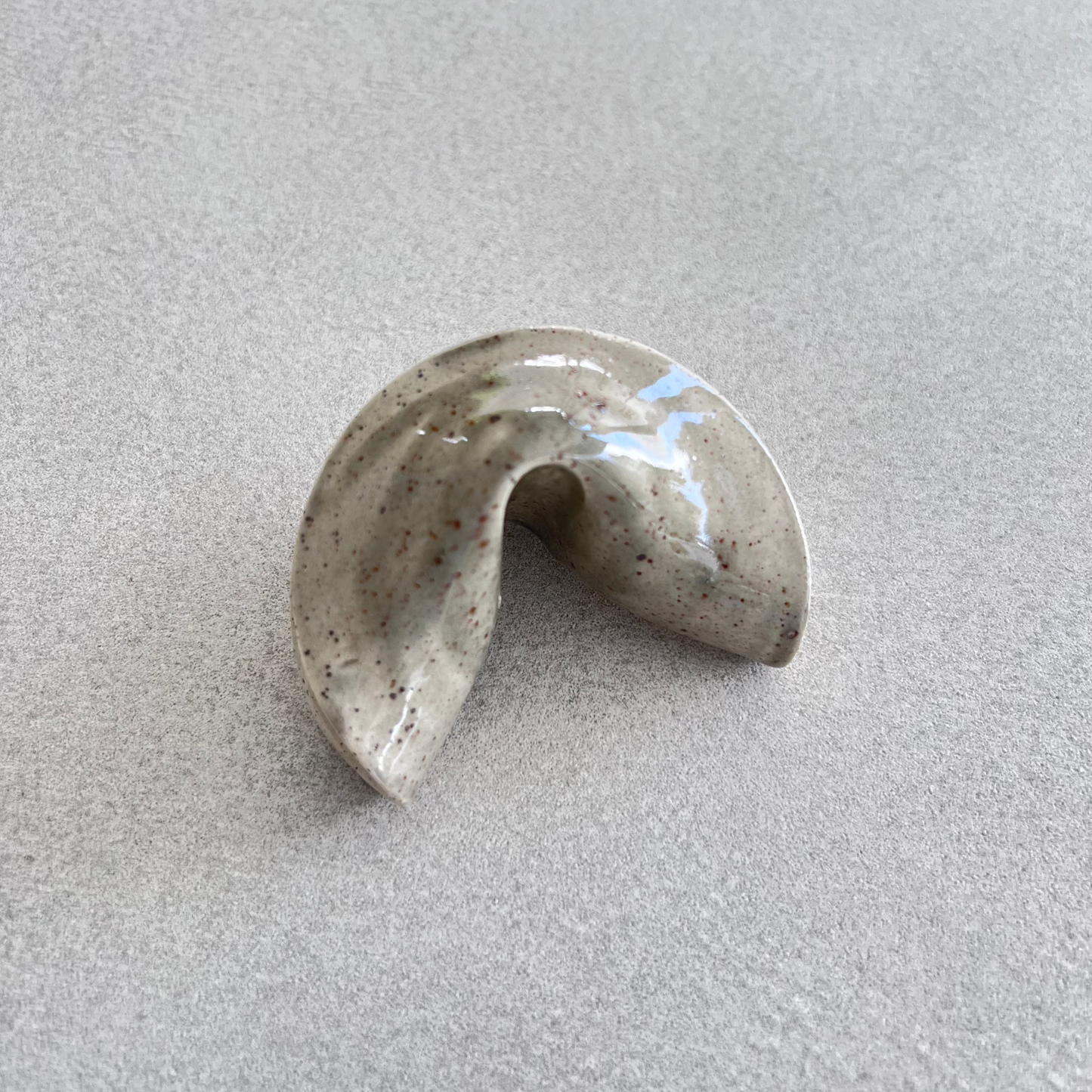 
ceramic fortune cookie
