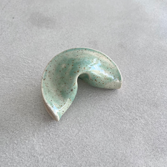 
ceramic fortune cookie
