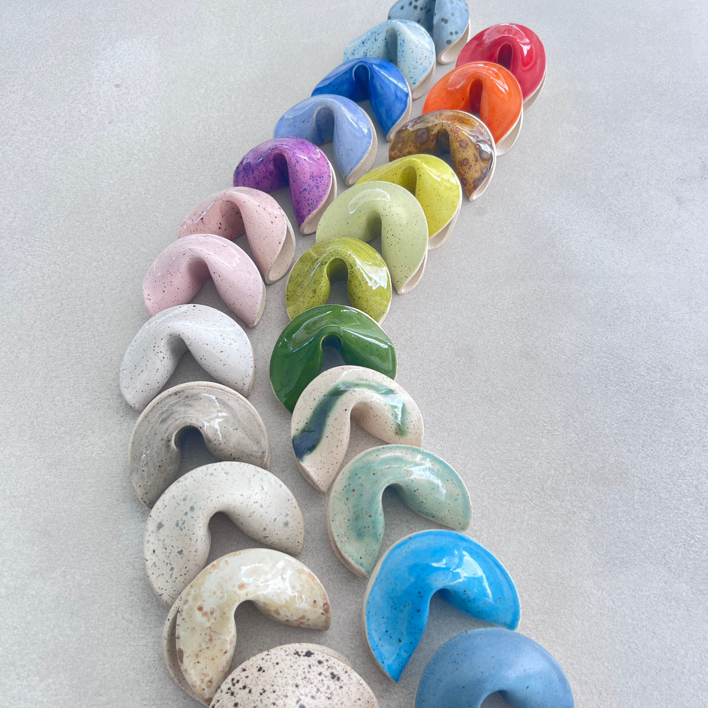 collection of colorful ceramic fortune cookies
