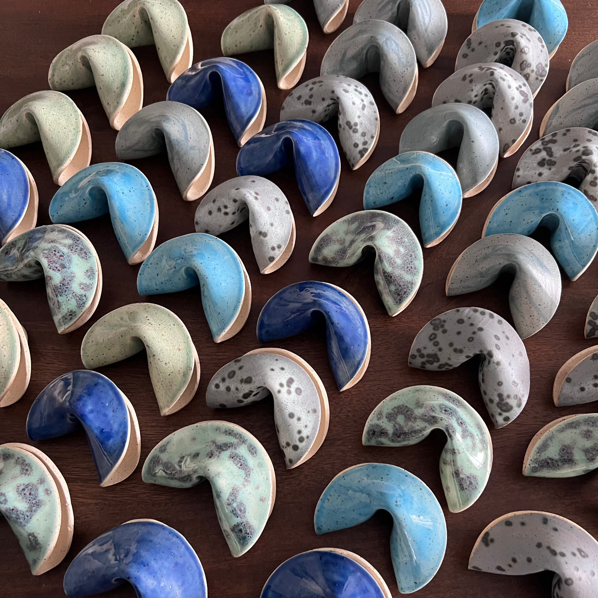 Collection of ceramic fortune cookies