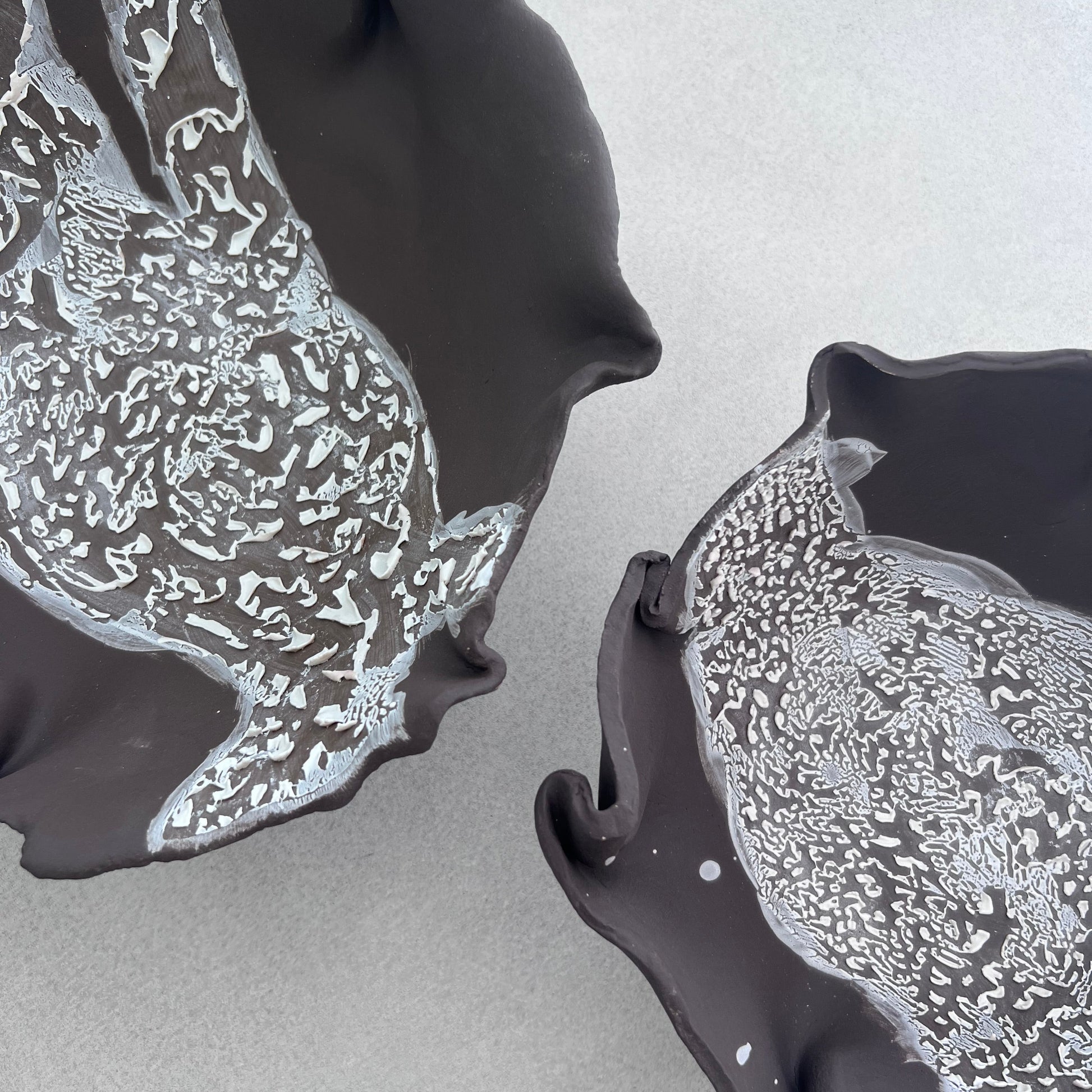 Decorative brown bowls with white cracked glaze
