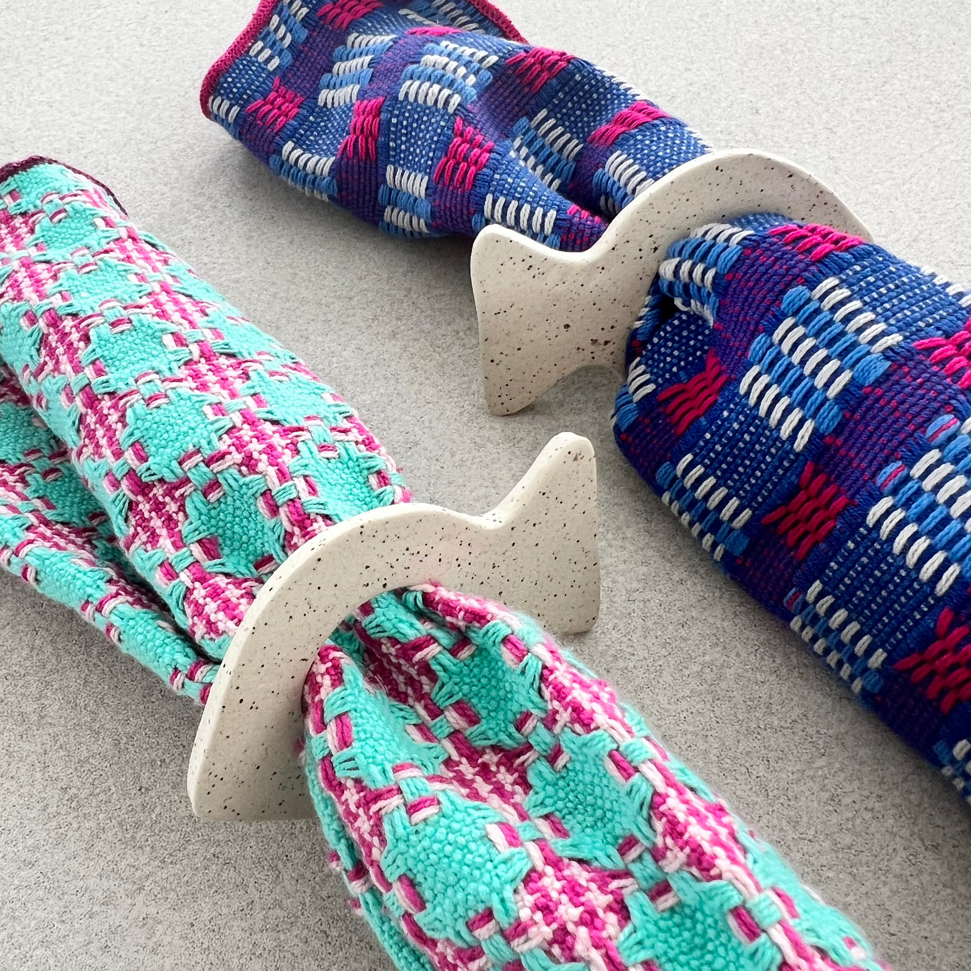 Four fish-shaped ceramic napkin rings 