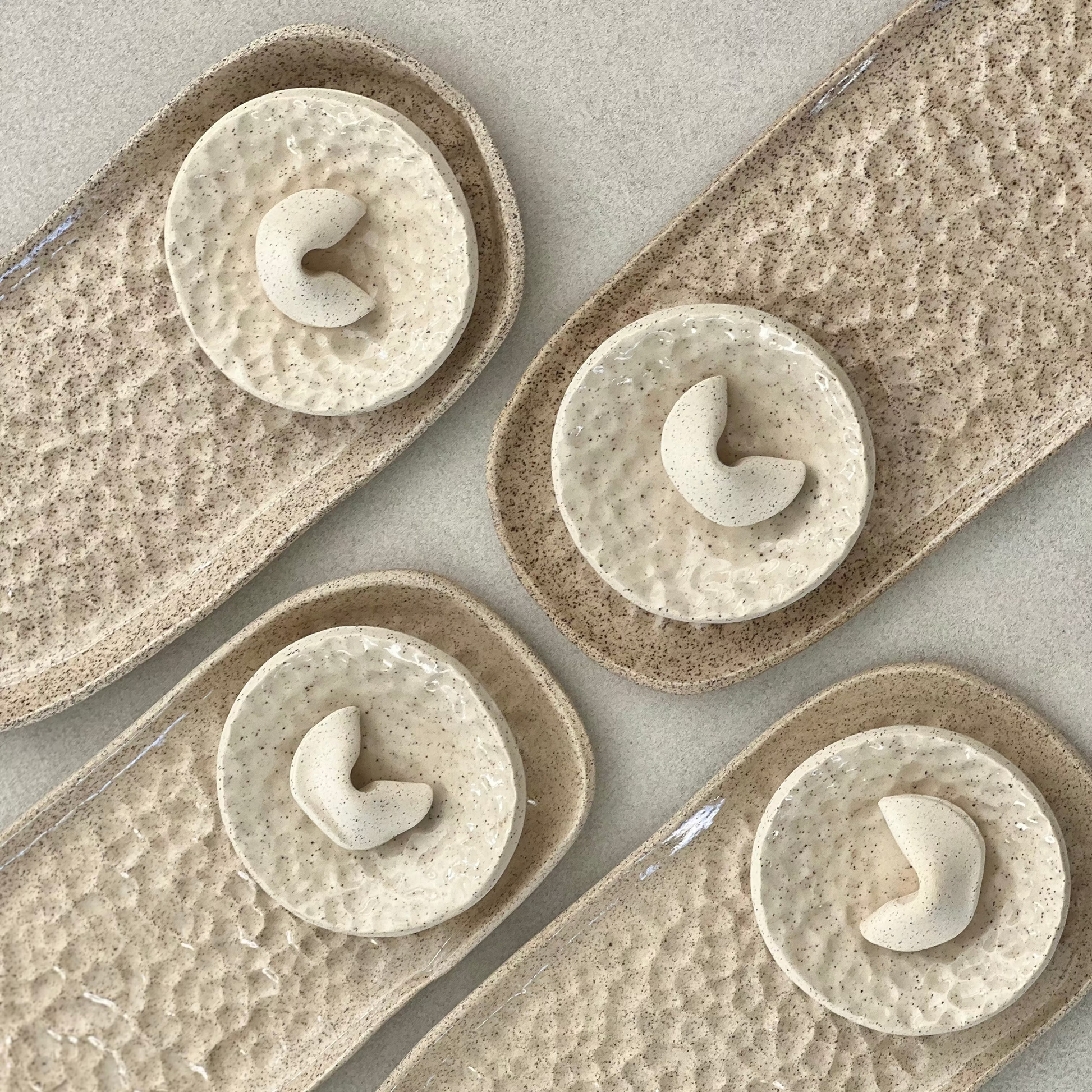 ceramic sushi dining set: chopsticks, chopstick holders, dipping dish and plate